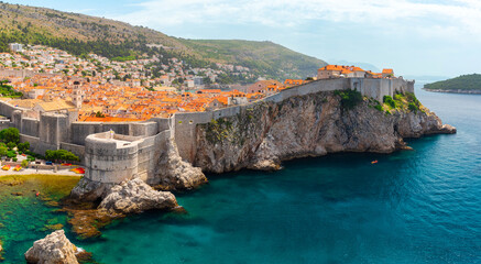 Panoramic view of Dubrovnik Old town on Adriatic sea, Dalmatia, Croatia. Medieval fortress on the sea coast. Popular travel destination. Summer vacation background - 761770529