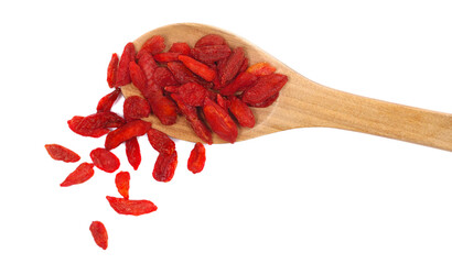 Pile dried Chinese wolfberries in wooden spoon, pattern goji berries isolated on white background,...