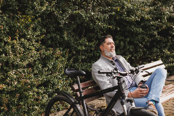 Man Enjoying Break on Park Bench