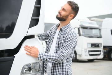 Man trucker hugging his truck