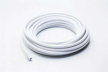 Coiled white fiber optics cable on white studio background. Internet and broadband communication concept