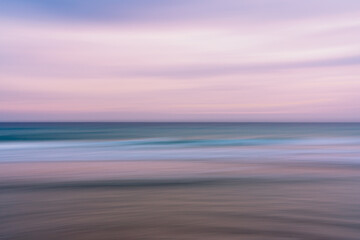 Pink sunrise over the sea, line art, motion blur. Abstract seascape background