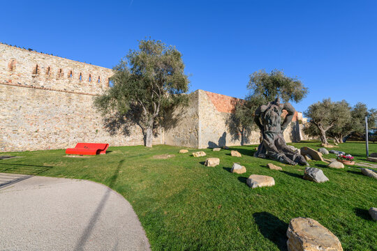 Exterior walls of the 18th century Forte di Santa Tecla, alongside the Gino Napolitano Gardens and Monument to the Resistance sculpture at the coastal resort town of Sanremo, Italy.