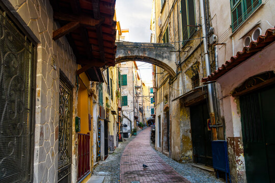The narrow, hillside twisting alleys, bridges and tunnels in La Pigna di Sanremo, the medieval old town of the coastal city of Sanremo, Italy in the Liguria Imperia region of Northern Italy.