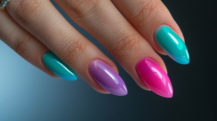 Multicolored almond-shaped nail design with turquoise and pink polish. Close-up beauty shot for design and print - obrazy, fototapety, plakaty