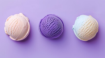 three scoops of ice cream sitting on top of each other on a purple and purple surface in a row.