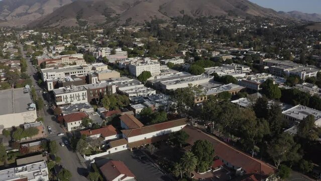 San Luis Obispo, California, USA - December 3, 2021: Aerial view of afternoon light shining on the historic buildings of the downtown core.