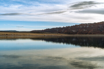 Reflection of rock ranges in water
