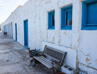 Blue Window Frames and White Adobe Walls of Historic Hotel in The Armagosa Desert, Death Valley Junction, California, USA