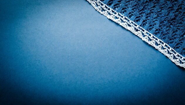 abstract blue paper background with dark vignette vintage paper lace texture copy space text place 2020 color trend classic blue pattern