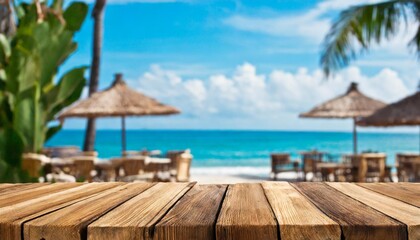 wooden table and blur beach cafes background
