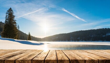 empty wooden table top background with free copy space snowy winter mountain lake nature with spruce tree forest at sunset light panorama with copy space