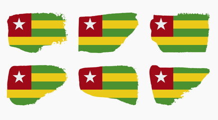 Togo flag set with palette knife paint brush strokes grunge texture design. Grunge brush stroke effect