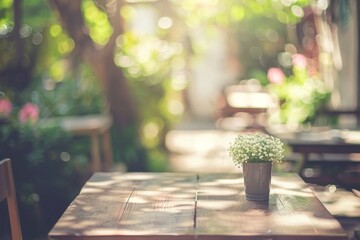 Blurred background - Coffee shop in garden blur background with bokeh. Vintage filtered image.