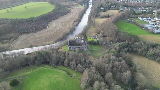 Scenic aerial footage of Doune Castle in Scotland. This 14th-century castle has become popular filming location for movies such as Monty Python and the Holy Grail, Outlander and Game of Thrones 