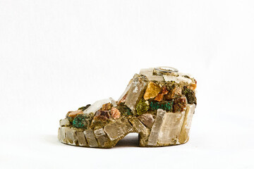 figurine of a container in the form of a shoe made of natural stones