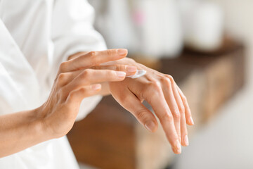 Cropped of woman enjoying her morning body care routine