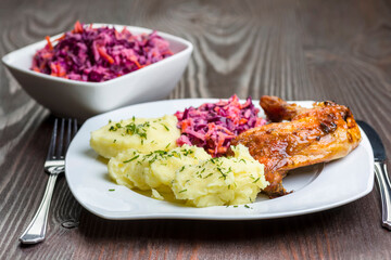 baked chicken leg, mashed potatoes and red cabbage salad - 761843107