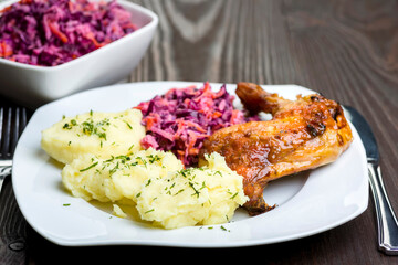 baked chicken leg, mashed potatoes and red cabbage salad - 761843117