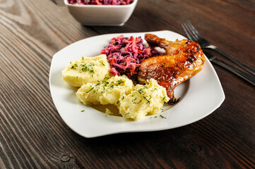 baked chicken leg, mashed potatoes and red cabbage salad - 761843124