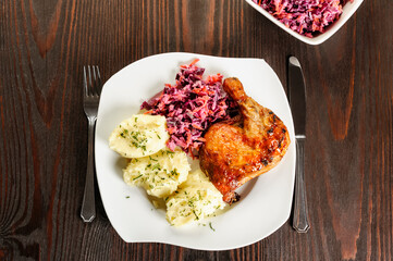 baked chicken leg, mashed potatoes and red cabbage salad - 761843129