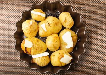 Hasselback potatoes with butter - 761843145