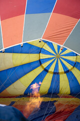 Obraz premium View inside a hot air balloon with flame during inflation