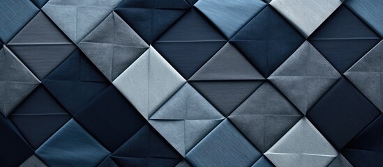 A close up of a geometric pattern in electric blue and white, resembling triangles and rectangles, on a wall