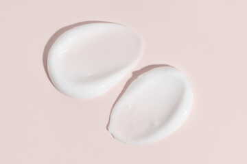 White beauty cream smear smudge. Cosmetic skincare product texture. Face cream, body lotion swipe swatch