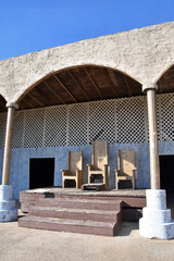 Three Chairs on a Stage