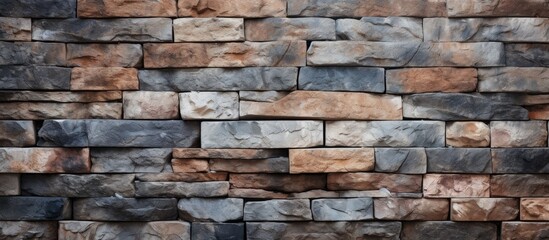 A closeup of a brown brick wall showcasing the intricate brickwork and rectangular pattern. The building material is a composite of wood, rock, and other natural materials