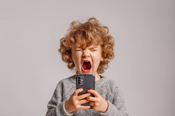 Upset Child Screaming Over Mobile Game Loss - Generation Alpha Challenge - obrazy, fototapety, plakaty