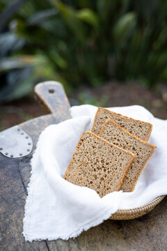 A basket of sliced bread made from ancient whole grains