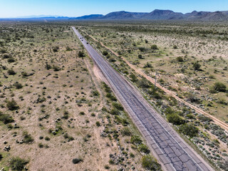 A Desert Road In Arizona with natural vegetation