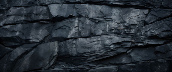 Dark rock texture background. Gray rock slate background.Black rock texture background. Close-up. Dark gray stone basalt background for design. Banner. Wide. Long. - obrazy, fototapety, plakaty