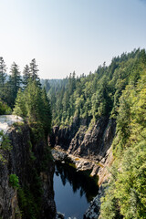 A beautiful view from Cleveland dam to Capilano river with clear blue sky