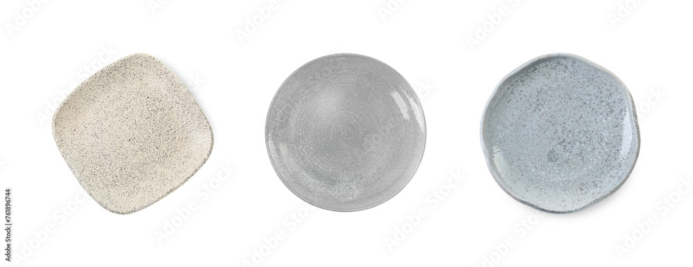 Poster Clean ceramic plates isolated on white, top view