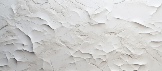 Abstract background with textured gypsum plaster and shallow depth of field.