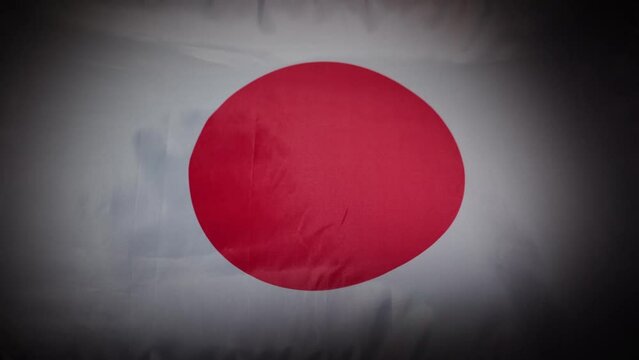 Japanese national flag fluttering and flowing with vignette