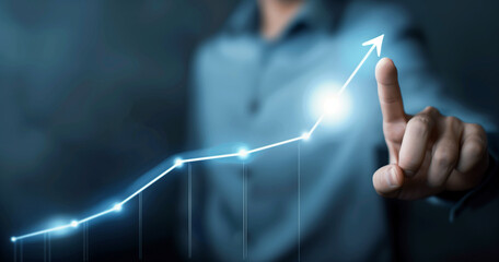 Businessman Interacting with Glowing Growth Arrow on Virtual Screen. Development and growth concept.
