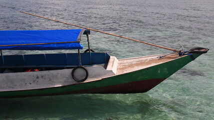 Obraz premium Wooden boats on the water, boats are used as a means of transportation