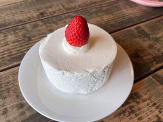 Strawberry short cake serving on the plate. Famous sweet dessert menu in bakery or coffee shop. 