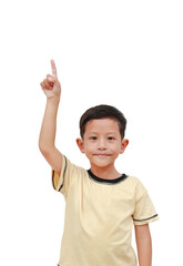 Portrait of Asian little boy kid pointing up isolated on white background.
