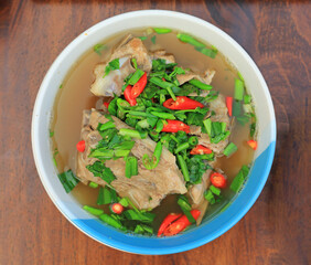 Hot and spicy pork bones soup, Lang zaap. Thai style food. Top view. - 761952745