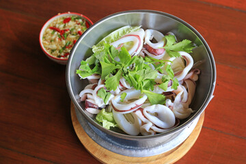 Steamed squid with spicy and sour sauce. - 761953141