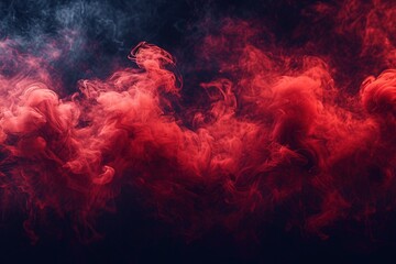 Abstract red smoke on black background. Dramatic red smoke clouds. Movement of colorful smoke.