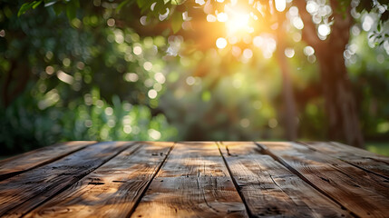 A wooden table with a blurred summer background, perfect for a relaxing outdoor picnic or leisurely vacation. - obrazy, fototapety, plakaty