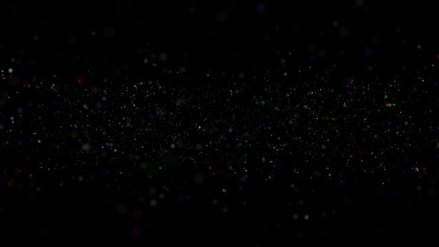  Artistic colourful flicker particles loop flying on black background.