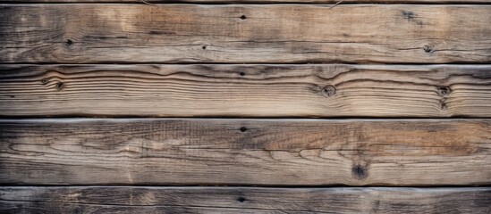 A close up of a wooden wall with multiple timber planks - obrazy, fototapety, plakaty