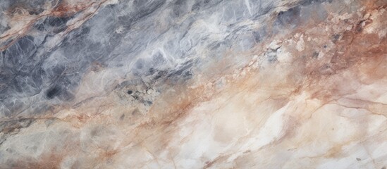 Marble stone texture background with subdued lighting.